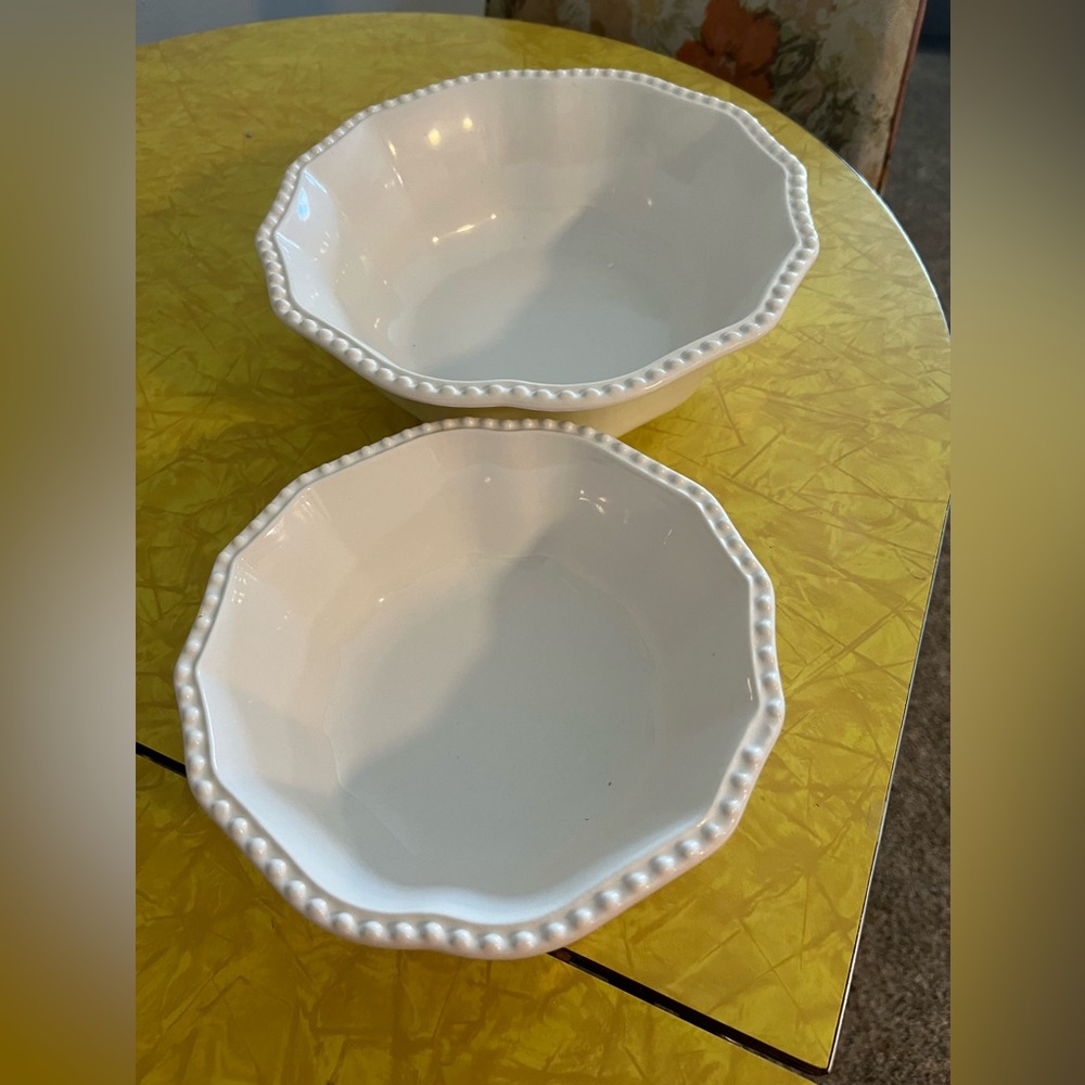 Cute white dish, can be used for anything such as a pie dish.